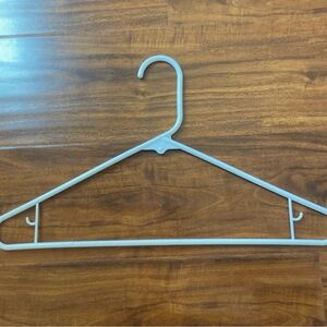 White plastic hangers total of 9